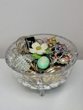 Mixed Jewelry In A Glass Dish